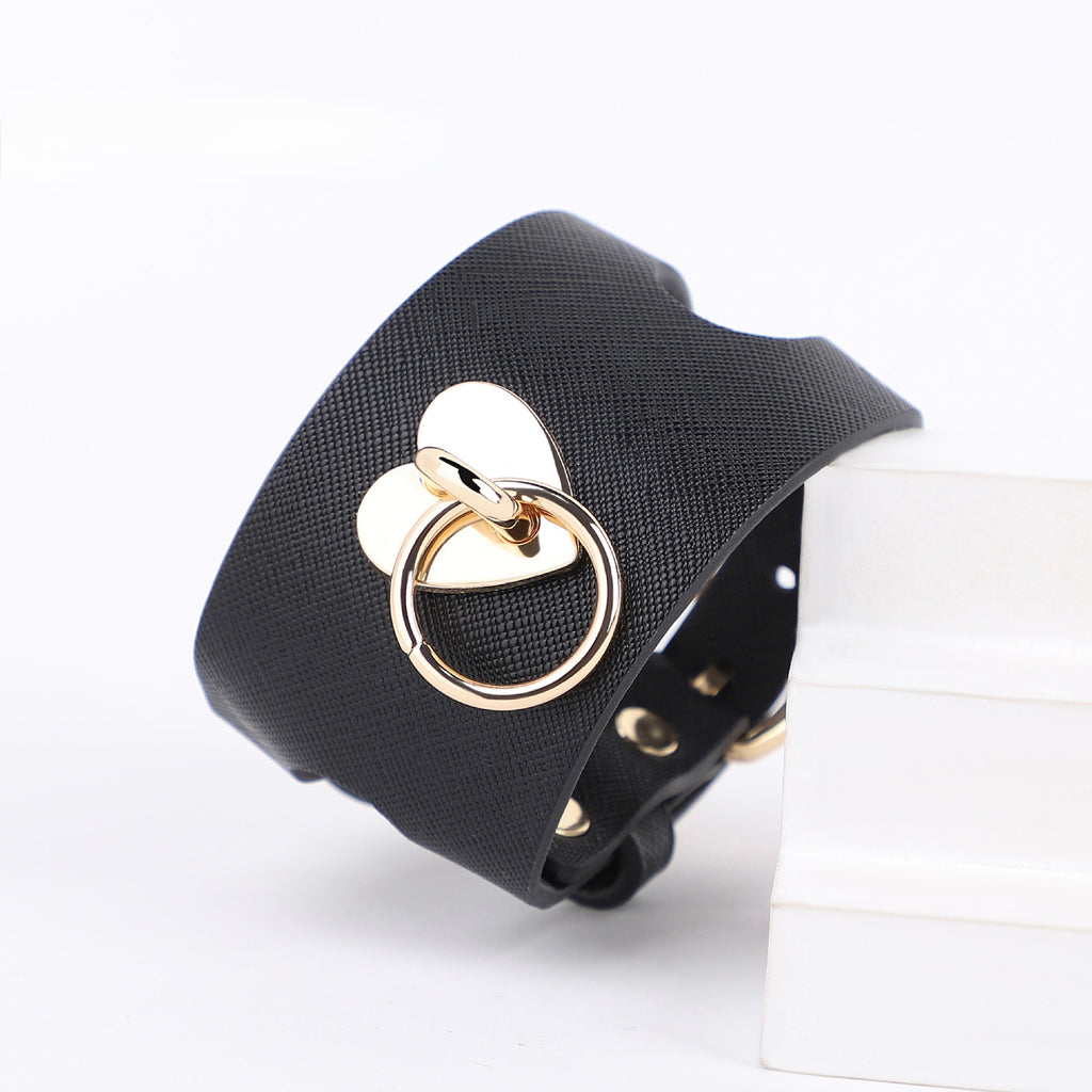 The Heartline Restraint Cuffs | Textured Vegan Leather & Gold Hardware