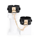 Chic Black Leather Restraint Set with Gold Accents and Diamond Cutouts