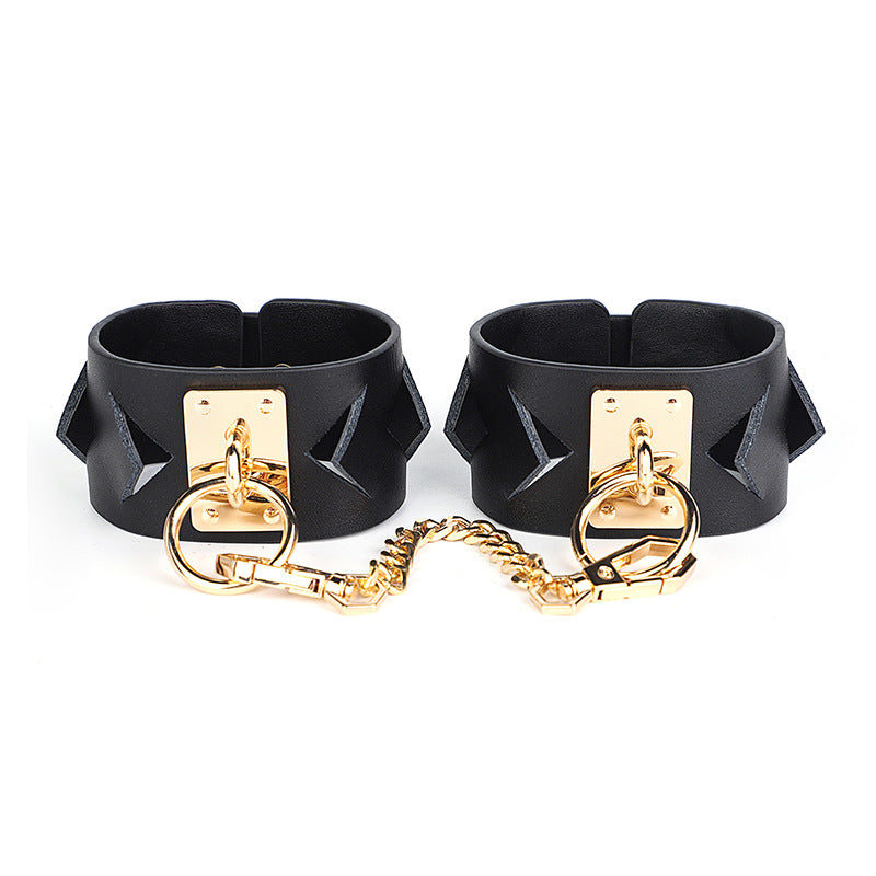 Chic Black Leather Restraint Set with Gold Accents and Diamond Cutouts