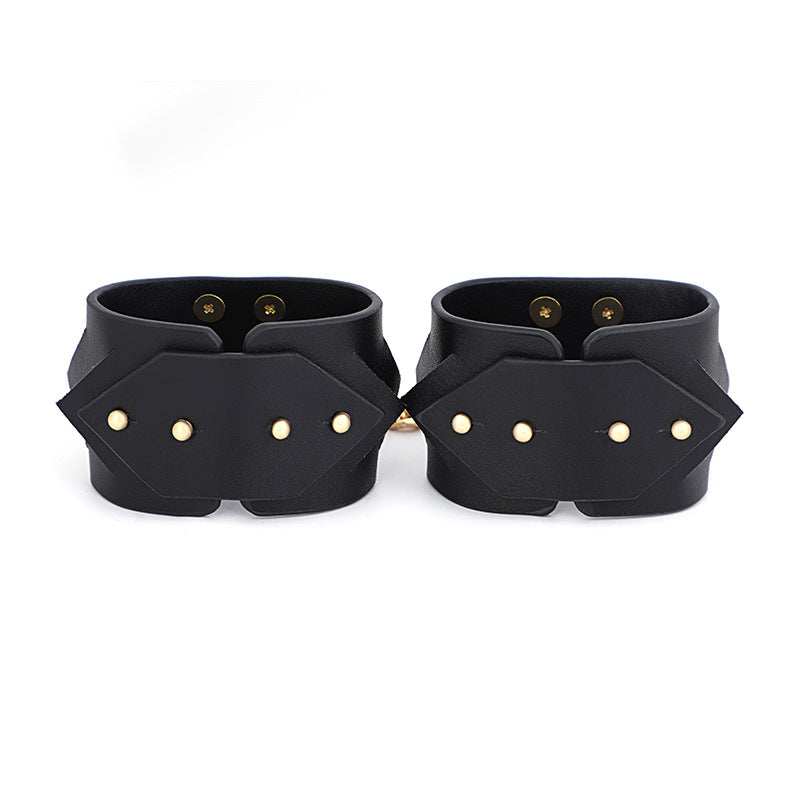 Chic Black Leather Restraint Set with Gold Accents and Diamond Cutouts