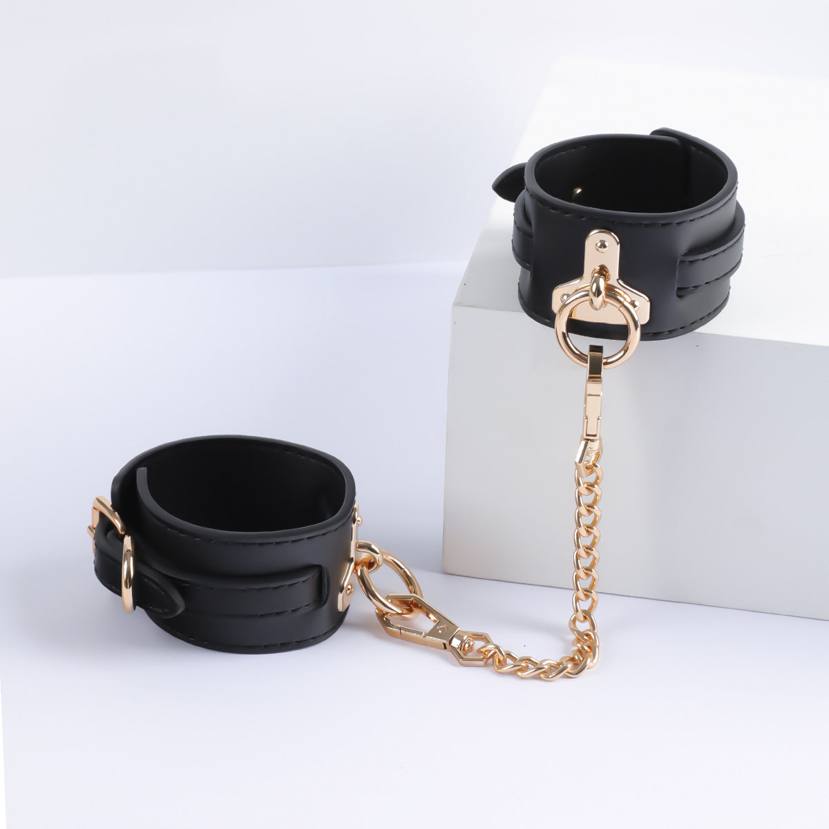 Gilded Embrace Leather Handcuffs black