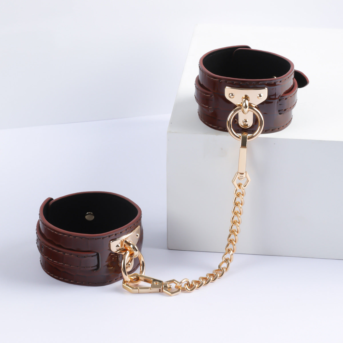 Gilded Embrace Leather Handcuffs brown