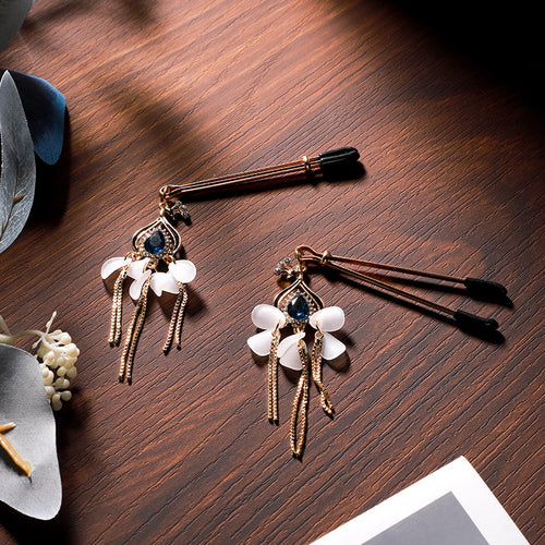 Gold Nipple Clamps with Blue Gemstone Pendants