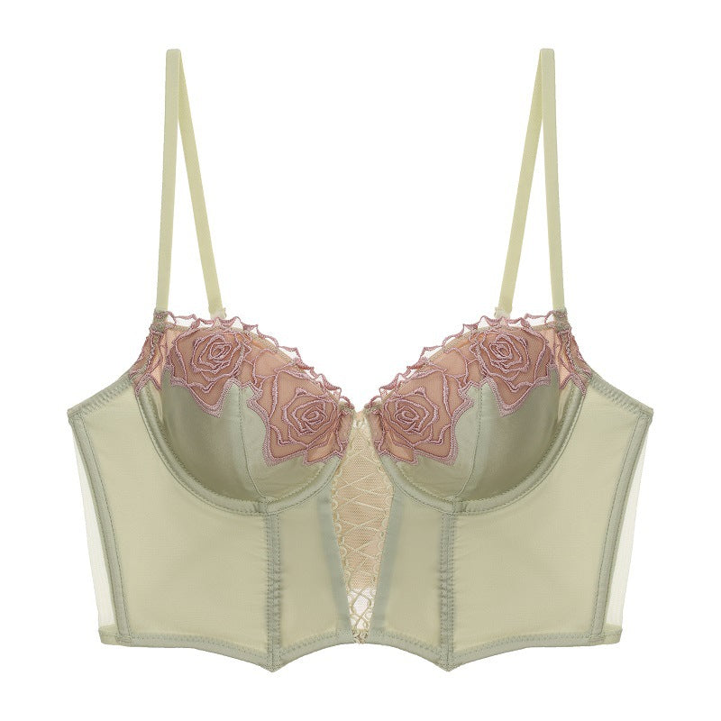 Front view of the Aeris longline bra in Sage & Blossom green with dusty pink rose embroidery.