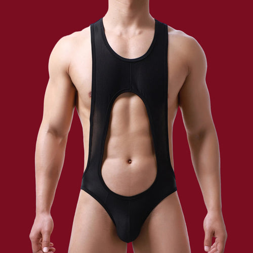 Male model wearing the Aeron Mesh Bodysuit in black, featuring a signature front cutout and breathable micro-mesh fabric.