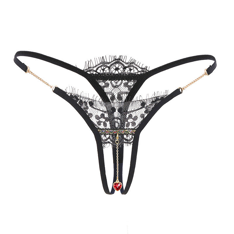Front view of the Amora Bijoux black lace crotchless thong with gold chains.