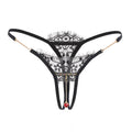 Front view of the Amora Bijoux black lace crotchless thong with gold chains.