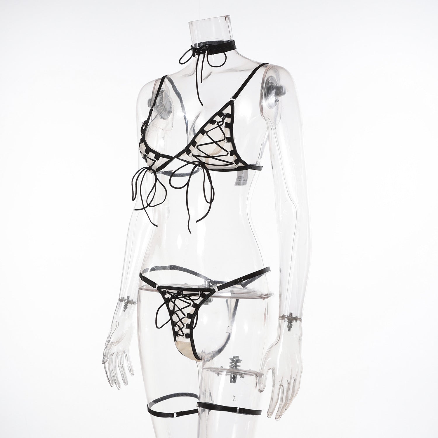 Studio shot of the Reckless Grace set on a mannequin, showing off the "undone" ribbon design and mesh.