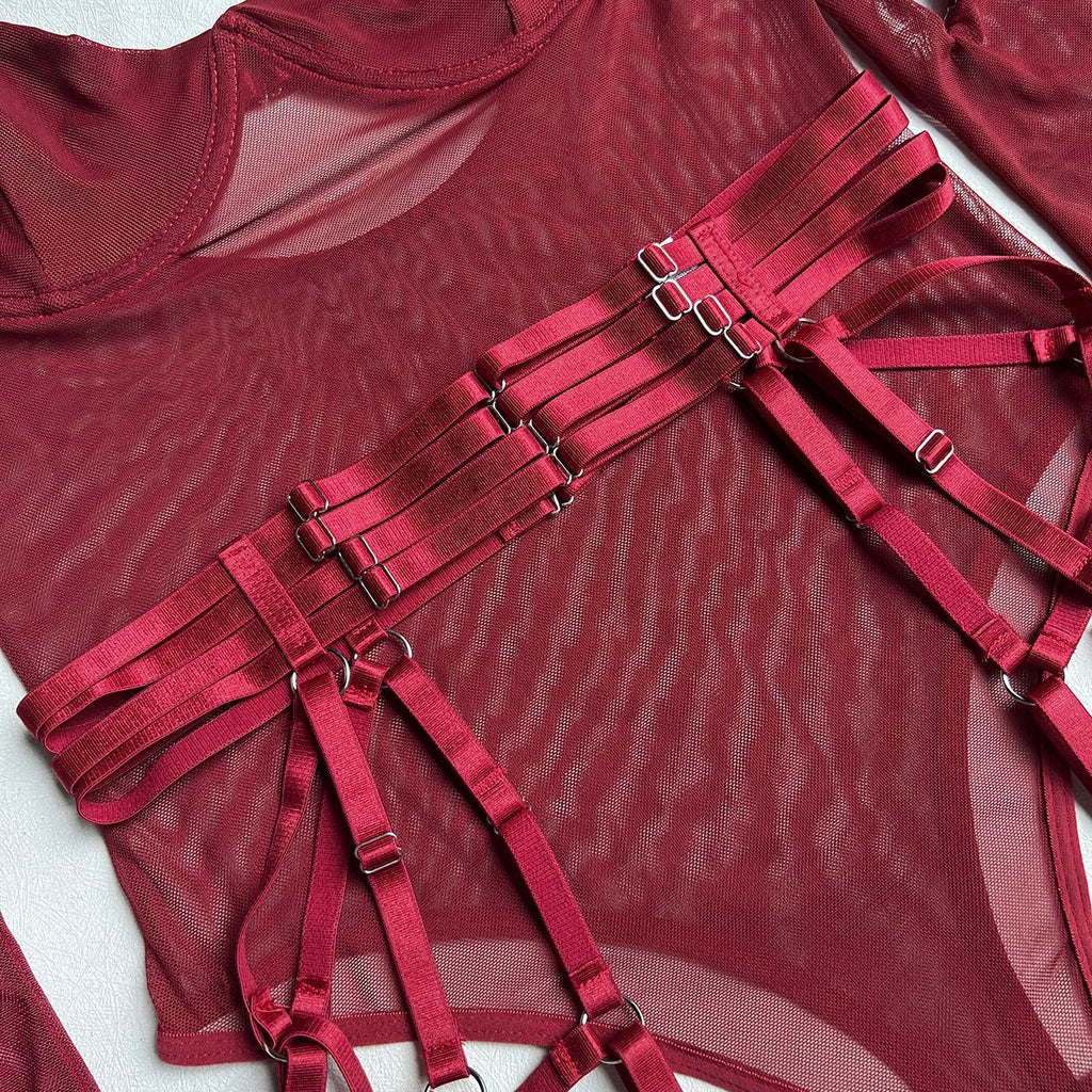 A detailed close-up of the adjustable silver-tone buckles and burgundy satin straps, highlighting the disciplined, industrial edge of the set.