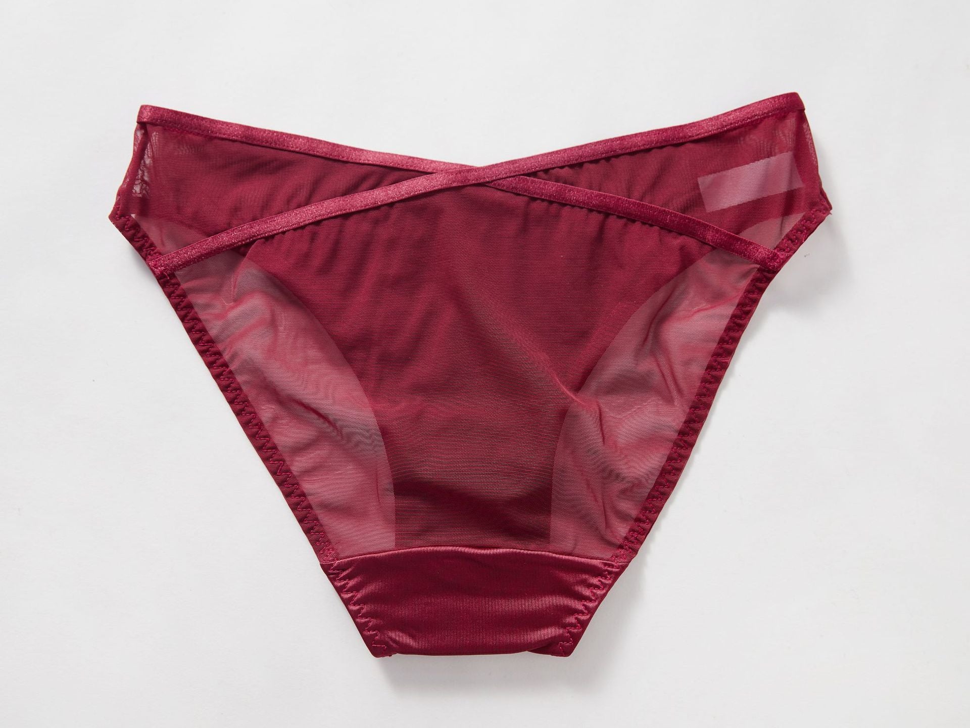 Rear view of the Crimson Veil Geometric Mesh Brief highlighting the breathable sheer mesh coverage.