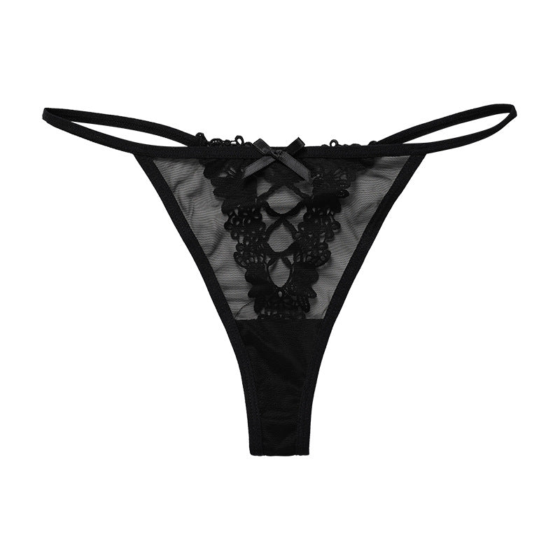 Black crochet lace semi-sheer thong panty displayed flat, front view.
