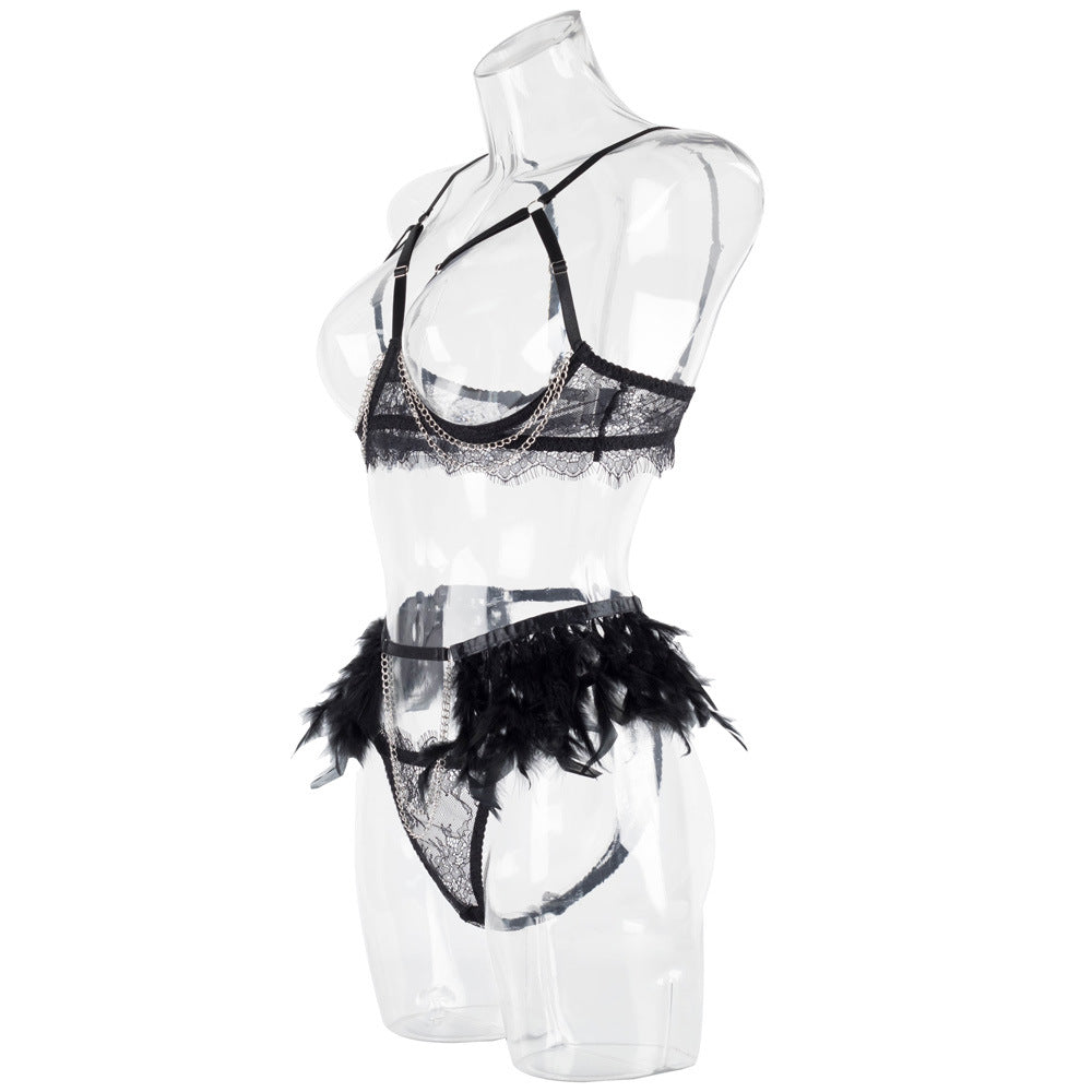 Side profile on a transparent mannequin, highlighting the high-cut leg architecture and the plush texture of the garter.