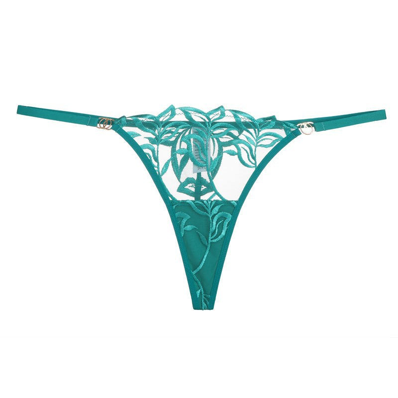 Front view of the Emerald green Flora Linear thong with botanical embroidery.