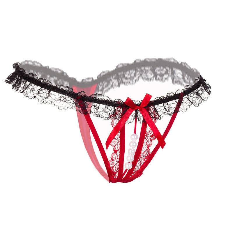 Side view of the lace ouvert panty showcasing the pearl strand and slim straps.