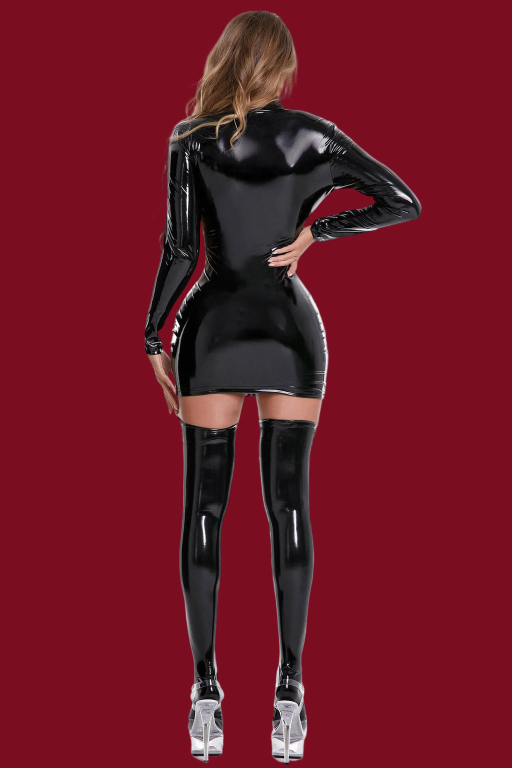 The rear view of the black Line of Control dress, emphasizing the clean, disciplined lines and the supportive second-skin silhouette.