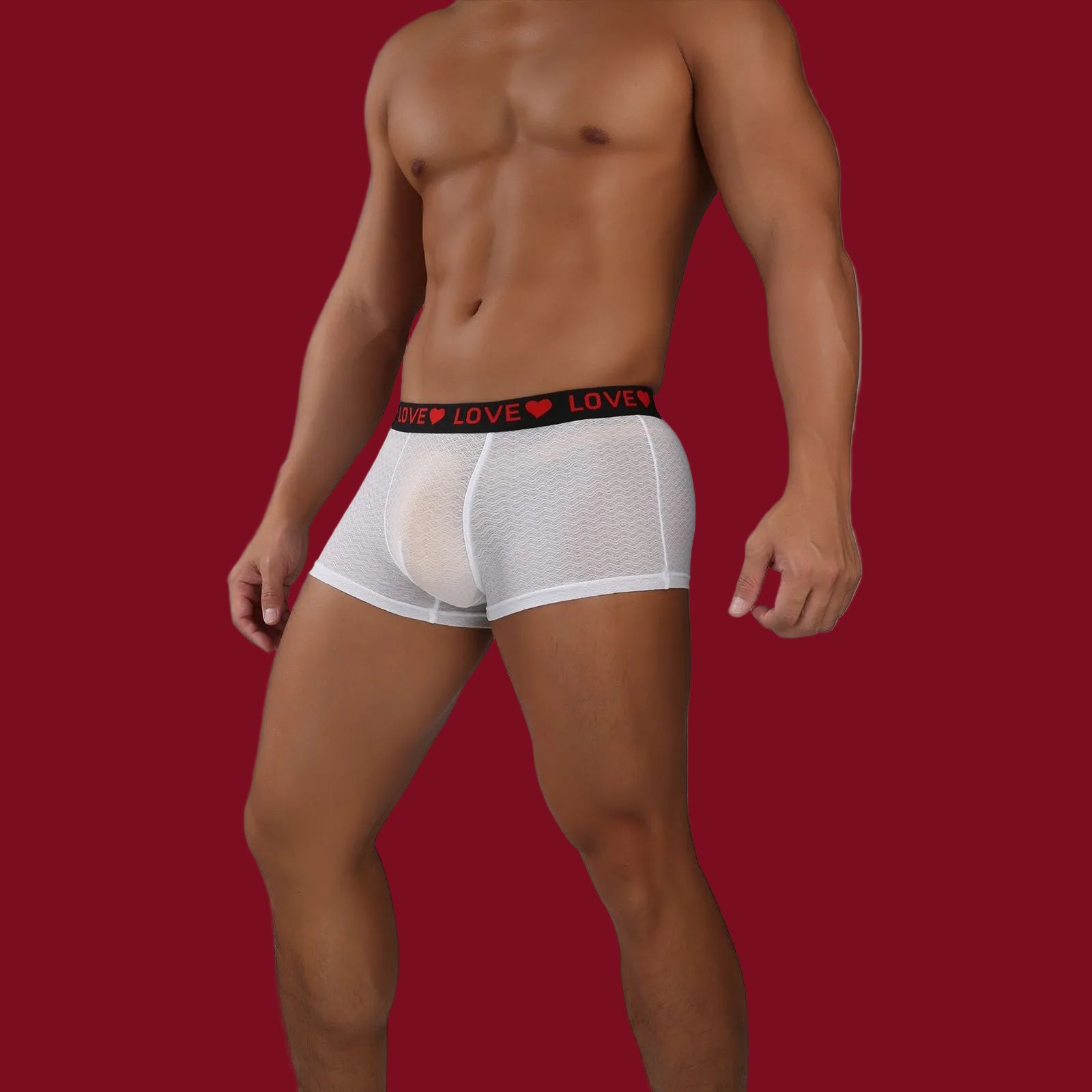 Men’s sheer mesh boxer with short-leg cut and modern silhouette.