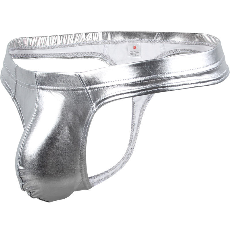 Side profile of a 3D silver metallic thong, emphasizing the athletic silhouette and low-profile cut.