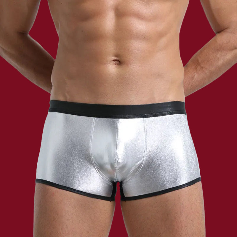 A secondary study of the Ion Silver edition, highlighting the garment's ability to contour the physique through light-reactive metallic fibers.