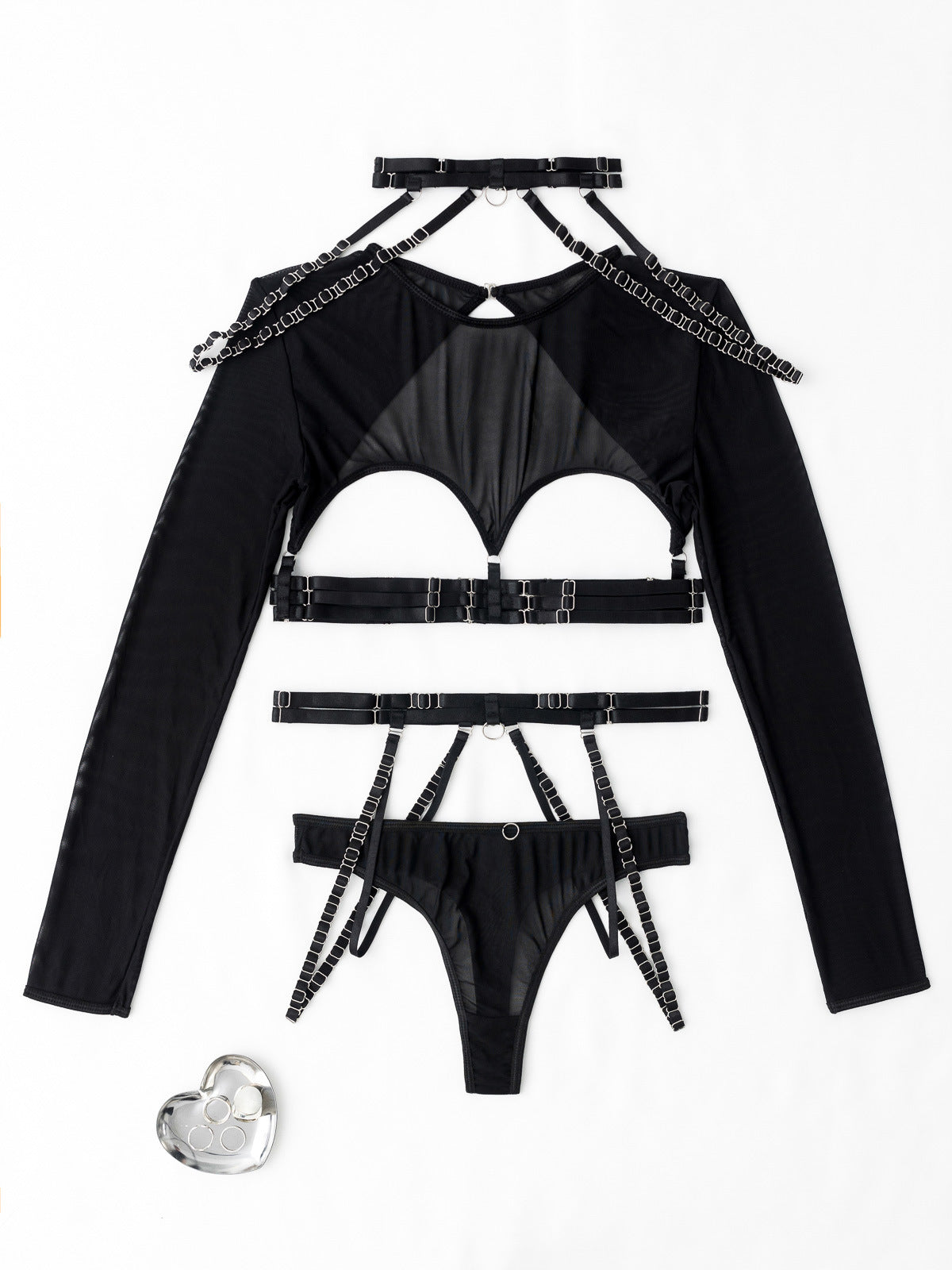 A clean flat lay of the full ensemble, showing the tactile quality of the mesh, the silver chains, and the choker.