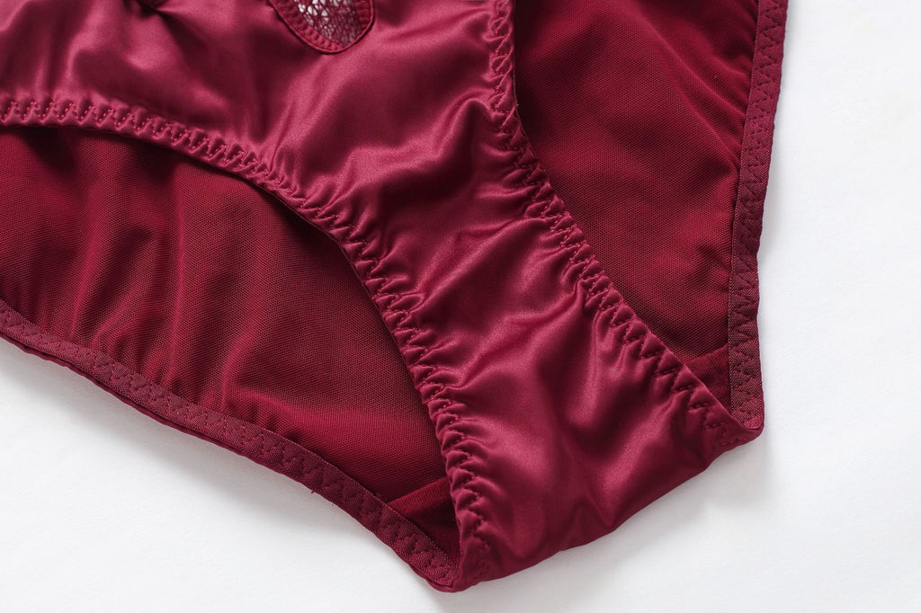 Close-up of the breathable 100% cotton gusset lining on the Nocturne Desire satin panty for hygiene and comfort.