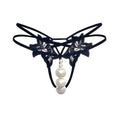 Front view of the Pearl Radiance thong featuring a strand of lustrous pearls and open-frame design.