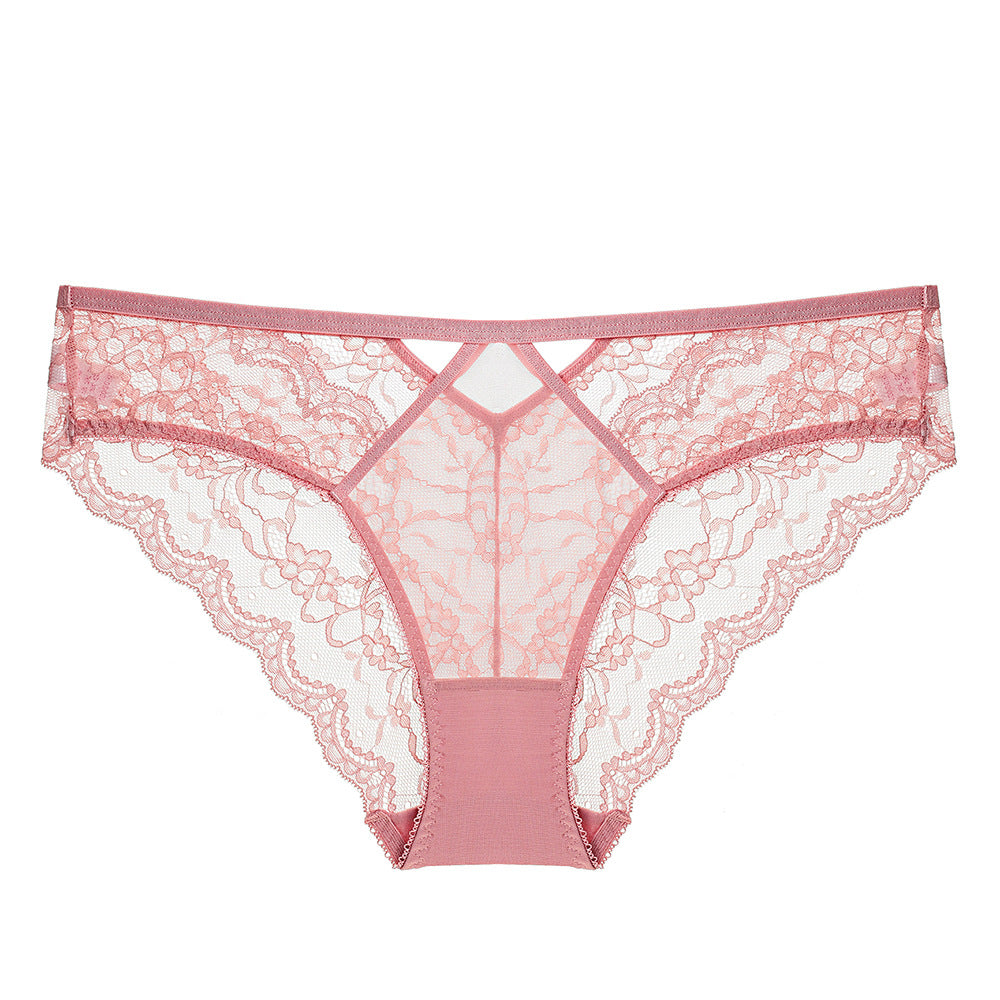 A front-facing studio shot of the Petal Frame briefs in dusty rose, highlighting the intricate floral lace and the signature geometric waist cut-out.