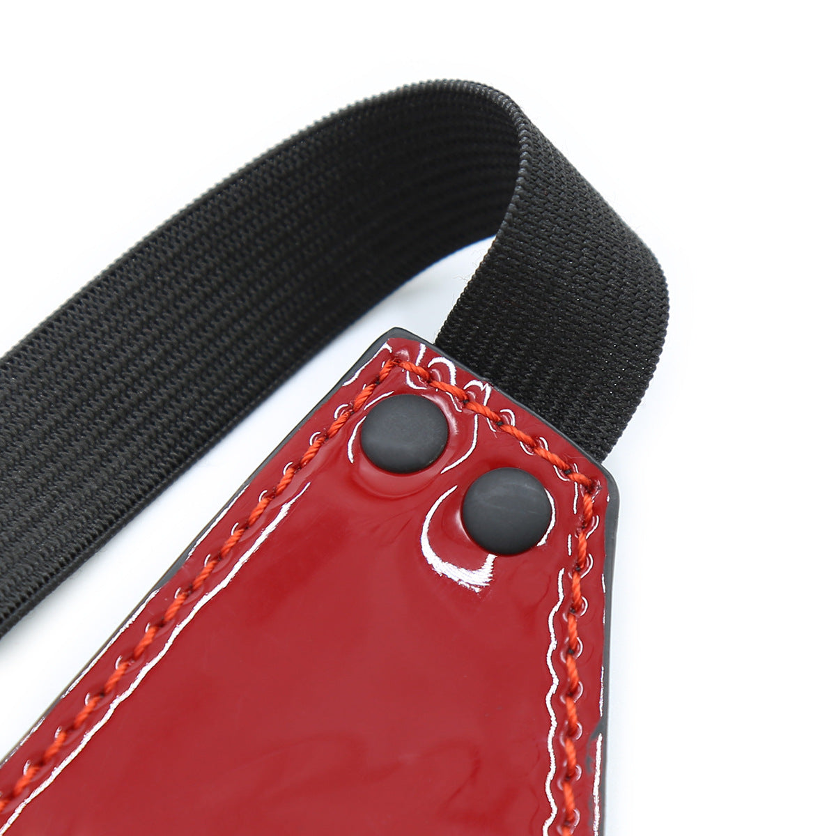 Macro view of the reinforced red stitching and smooth finished edges on the back of the Crimson Quintet eye mask.