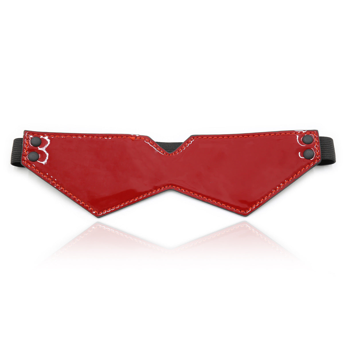 A minimalist, geometric eye mask in high-gloss red patent leather with a comfortable elasticated strap for sensory deprivation.
