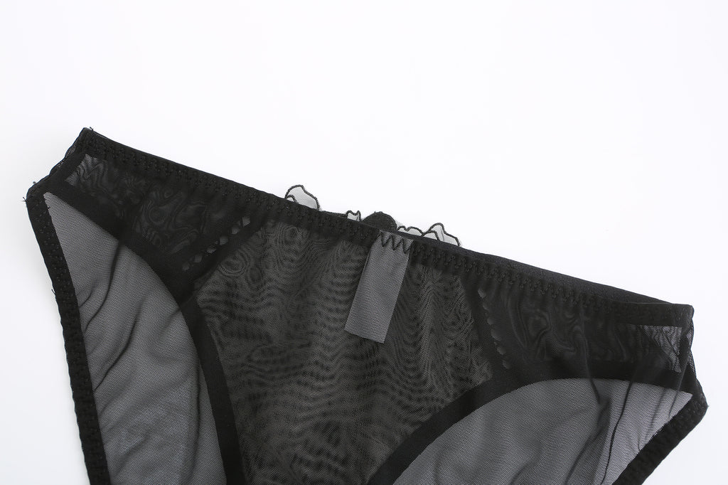 Macro shot of the high-quality black Nylon-Spandex mesh fabric.