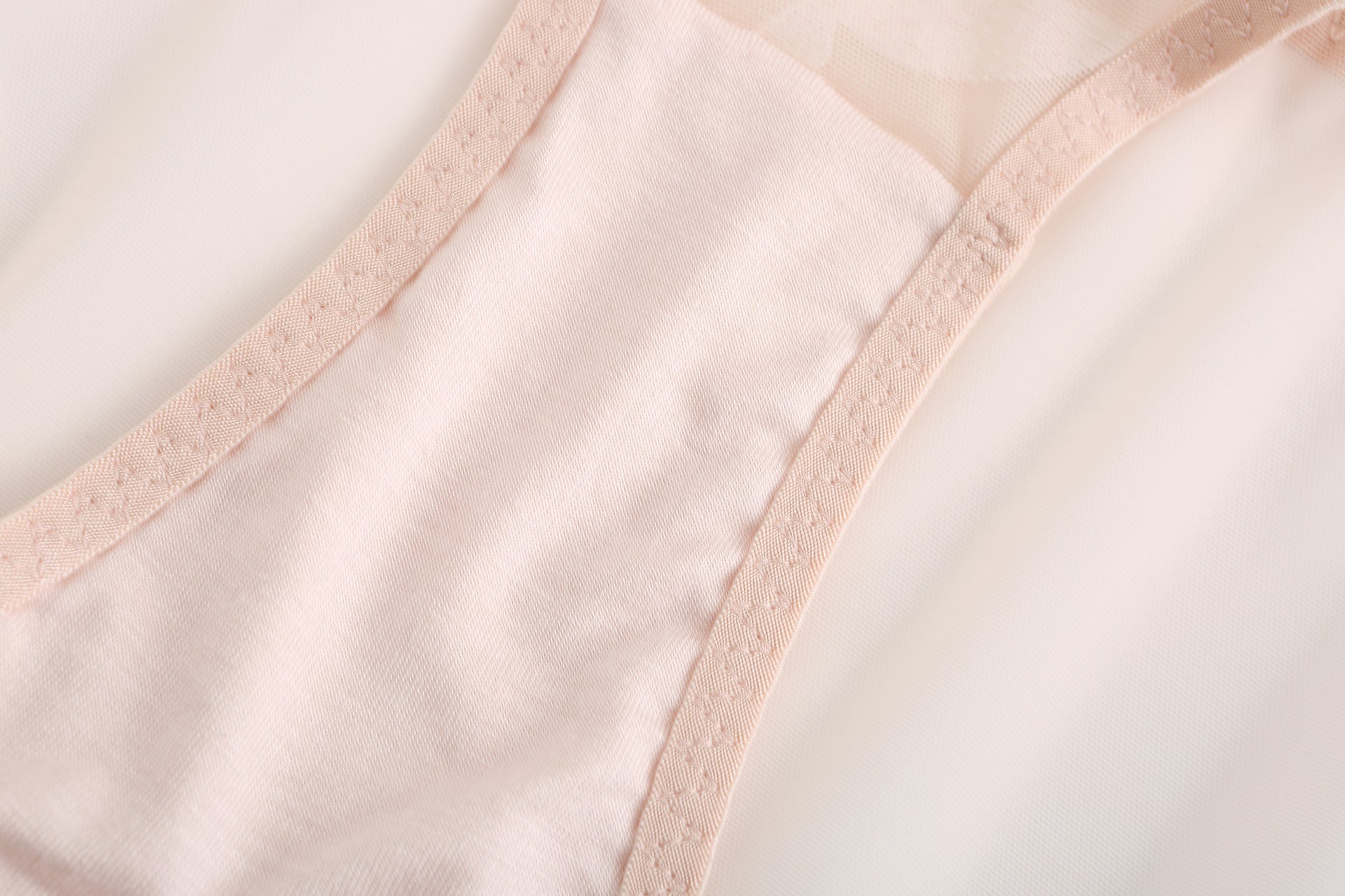 Inside view showing the soft finish and high-end construction of the Rosaine nude brief.