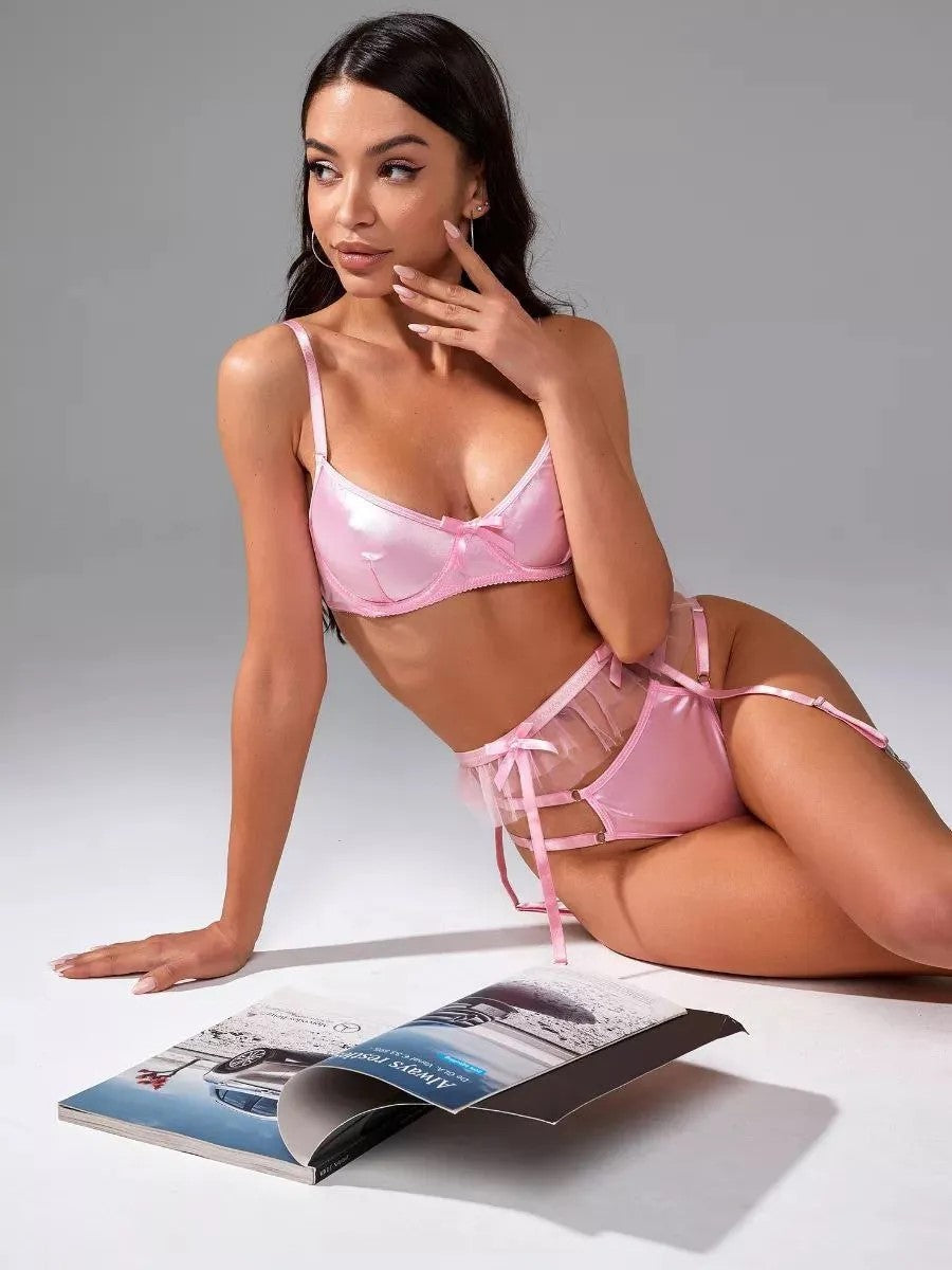 A relaxed lifestyle view of the pink satin ensemble, perfect for unscripted dates and quiet, radiant moments.