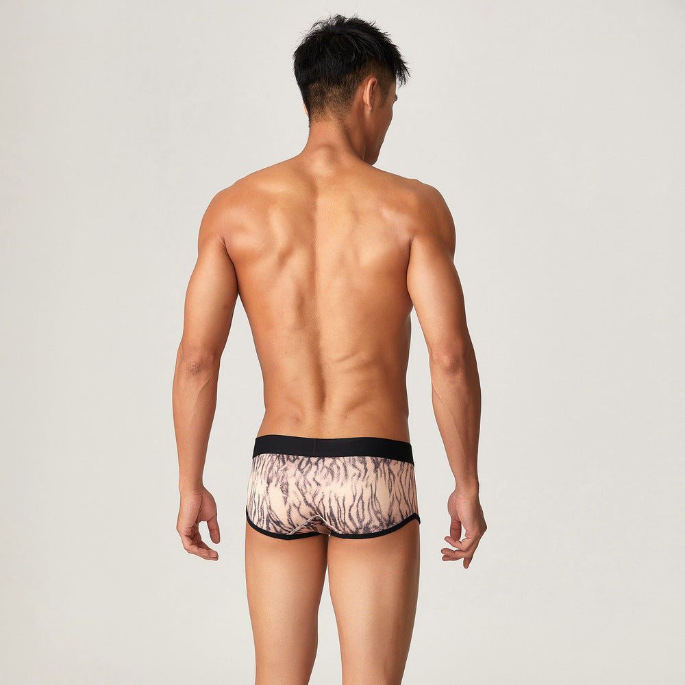 A clean rear view on a neutral background, illustrating the seamless transition of the tiger pattern and the secure, smooth-fit waistband.