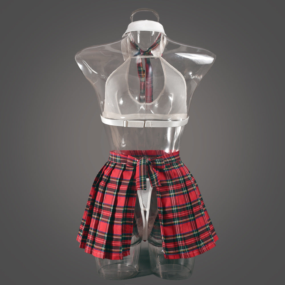 Rear view on a transparent mannequin, illustrating the "floating" mesh effect and the precise pleating of the red skirt.