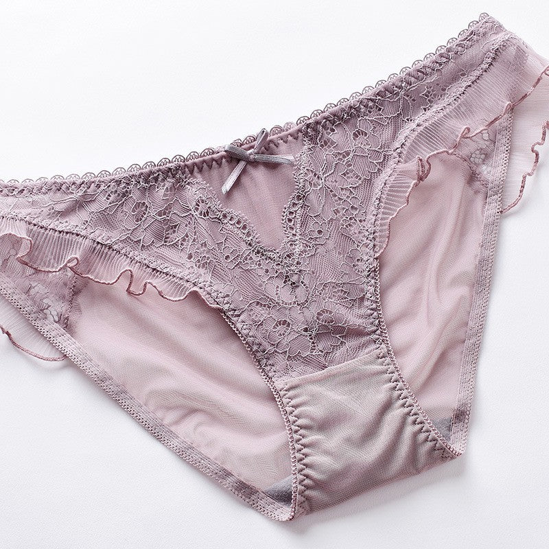Side view highlighting the delicate ruffle edges and sheer mesh texture of the Whisper Lace panty.
