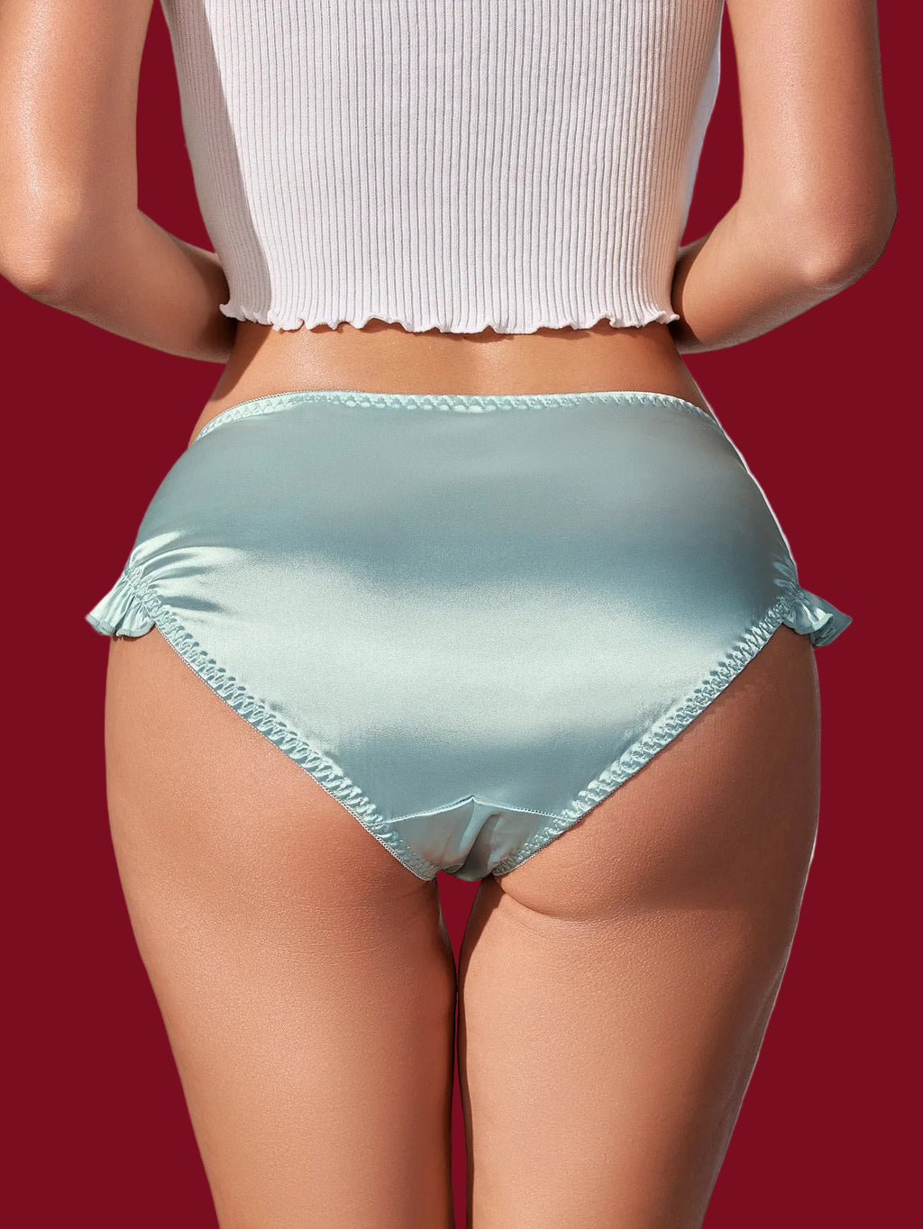 Back view of a mid-rise satin panty with a smooth, clean silhouette.