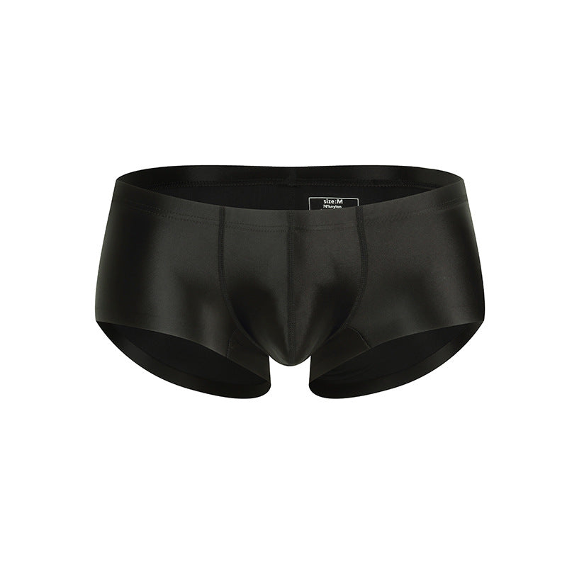 Men’s minimalist black nylon briefs with smooth fabric and contoured fit.