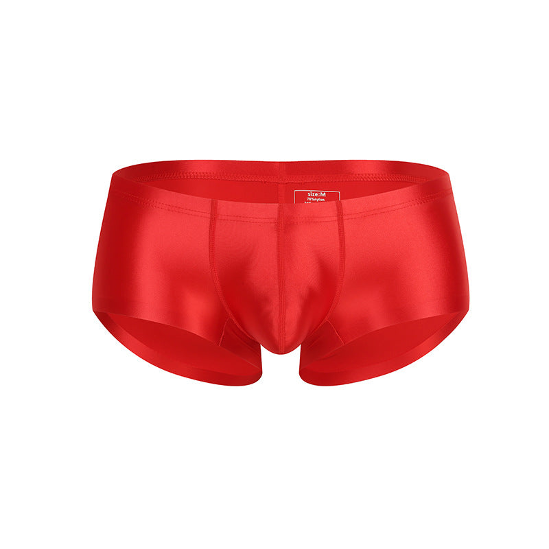 Men’s low-rise nylon briefs with smooth texture and sculpted shape.