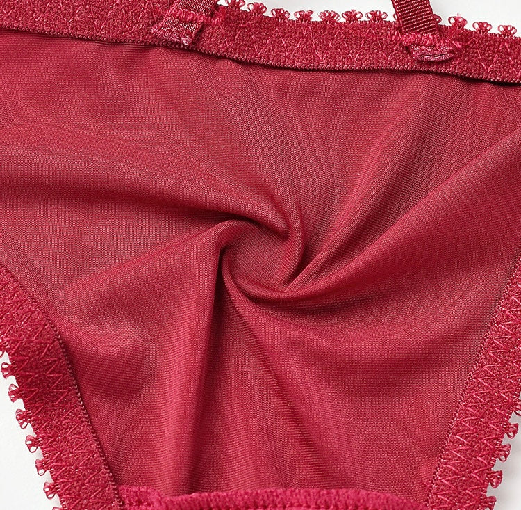 Close-up of the Crimson Bloom red mesh texture, highlighting the lightweight, breathable Nylon-Spandex blend.