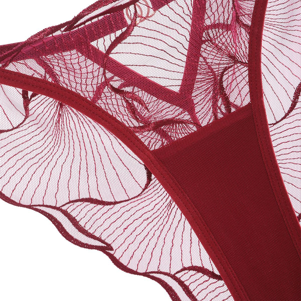 Macro shot of the high-density tactile wave embroidery flowing across the lightweight Velour Tide mesh.