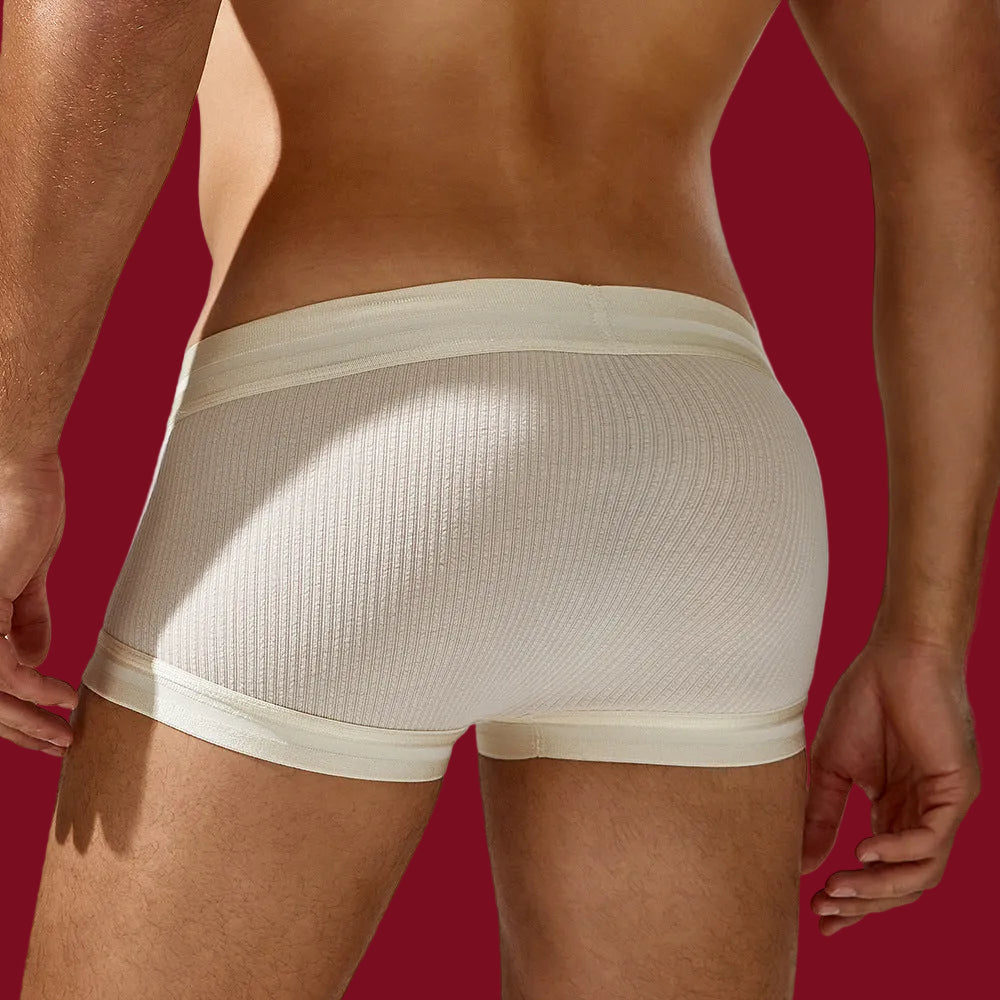 Dynamic pose showing how the white viscose fabric moves with the body without rolling or pinching.