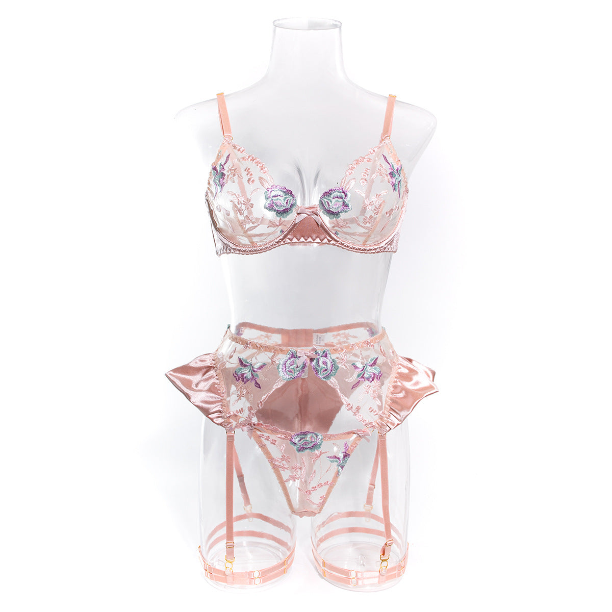 The Dawn Whisper (Blush Pink): A front-view mannequin shot highlighting the soft, rosy tones of the floral lace and the structural satin panels.