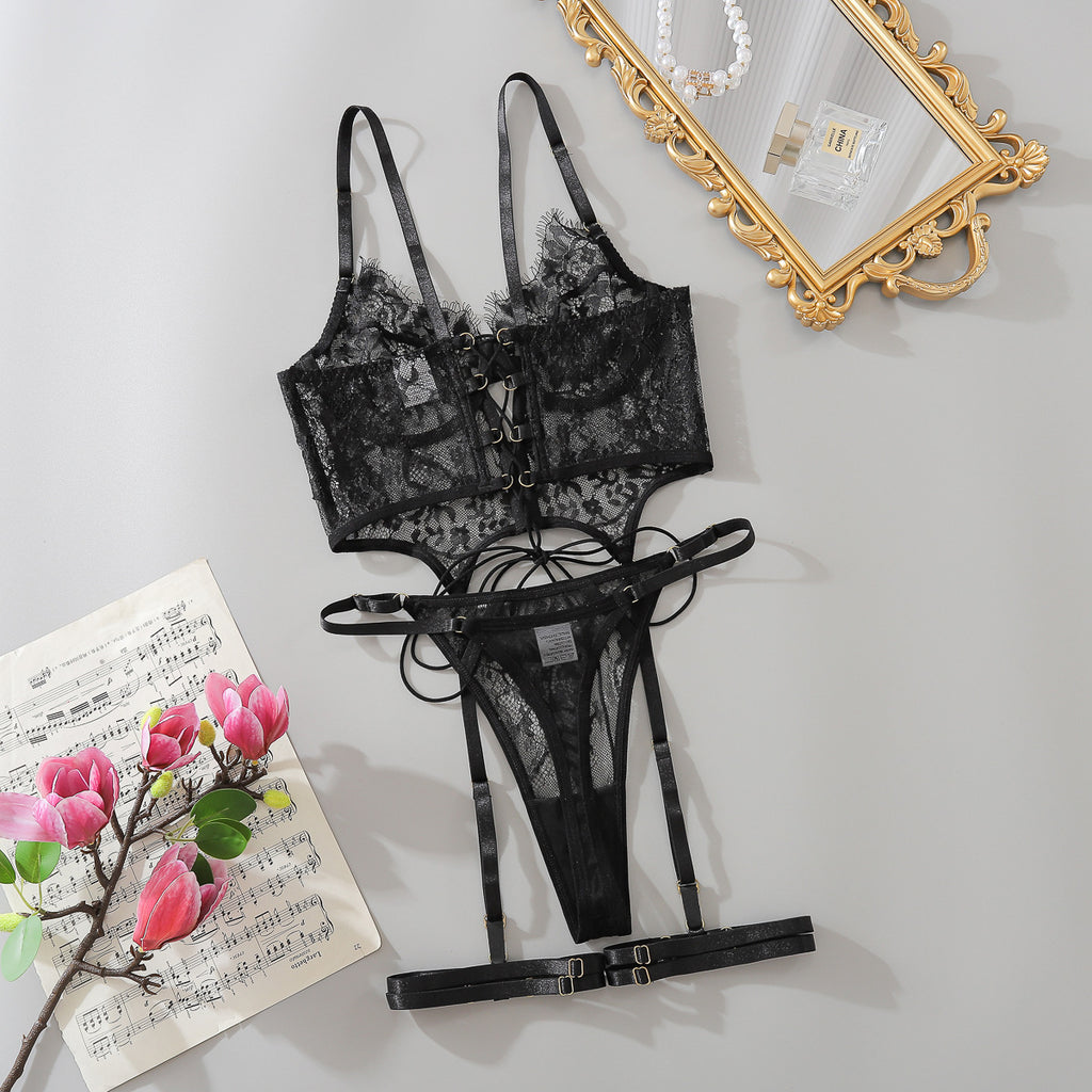 Aesthetic flat lay of the black lace set featuring botanical floral lace and jewelry-grade golden accents.