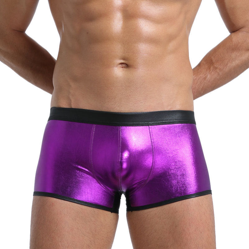Saturated ultraviolet metallic briefs curated for a futuristic aesthetic, featuring a high-gloss surface and architectural support.