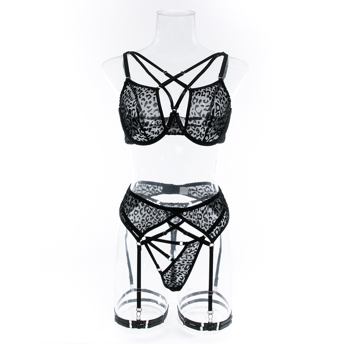 Front view of the strappy leopard set on a transparent mannequin, providing a clear look at the unlined bra structure and garter alignment.