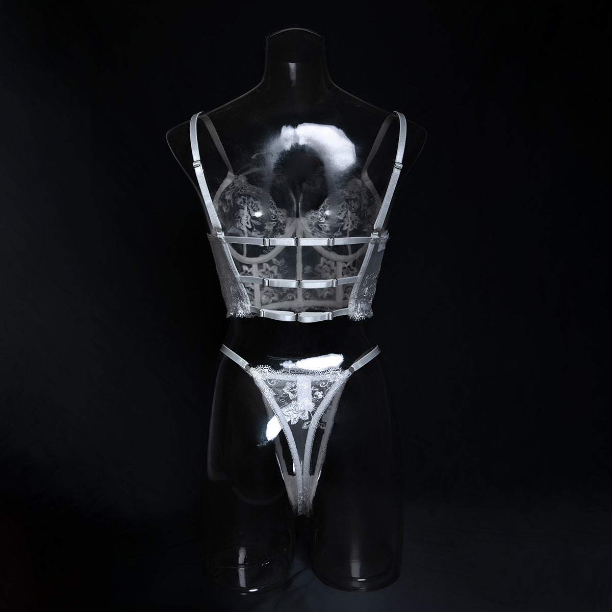 Back view of the white floral bustier, demonstrating the breathable structure that honors the natural curve.